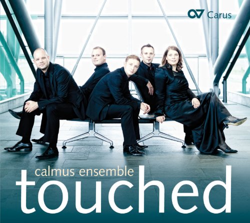 "Album cover with five musicians in black posing on a bench, 'touched' written below."