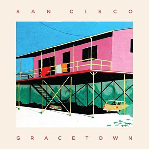 Album cover featuring a pink building with a yellow car parked below.