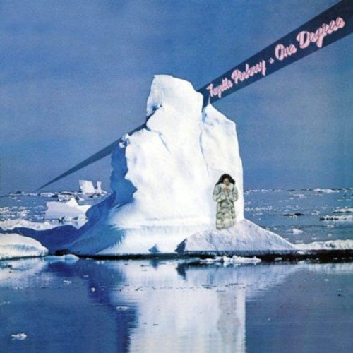 "Album cover with iceberg and person in parka, icy waters, and blue sky."