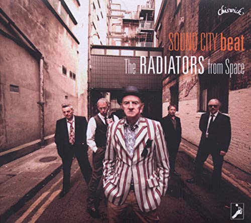 CD cover: five men in suits stand in a brick alleyway.