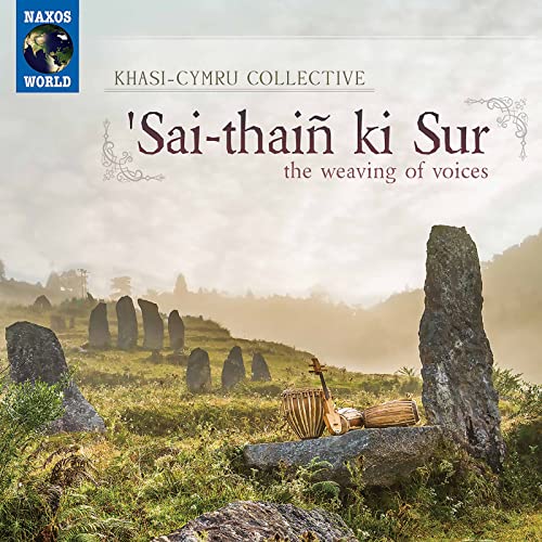 CD cover: misty landscape with standing stones, musical instruments.