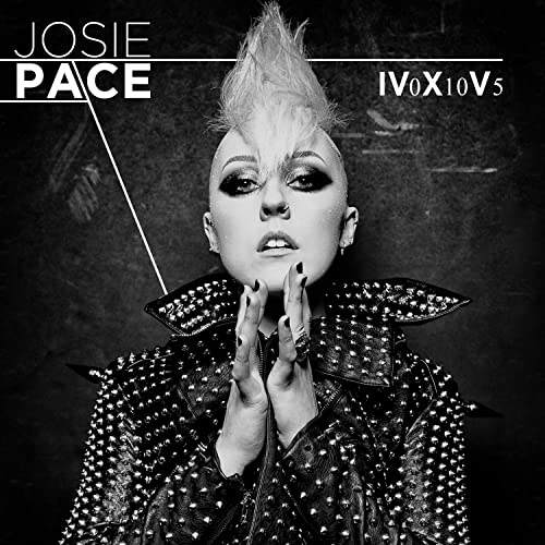 Black and white portrait of Josie Pace with spiked hair and leather jacket.