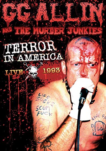 GG Allin with a bloody face and microphone on a dark, splattered red background.