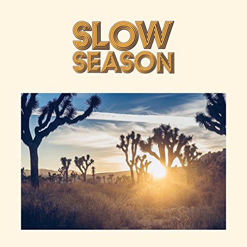 Vinyl album cover for Slow Season, featuring a desert landscape at sunset.
