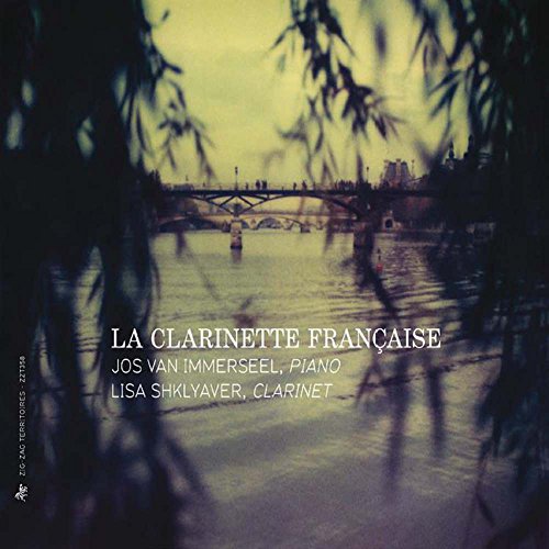 "CD cover with a river scene and white text, featuring a bridge and foliage."