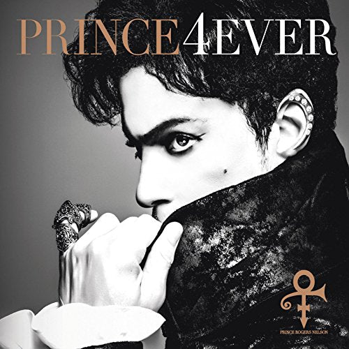 Prince album cover featuring a black-and-white portrait of Prince with dark hair and clothing.