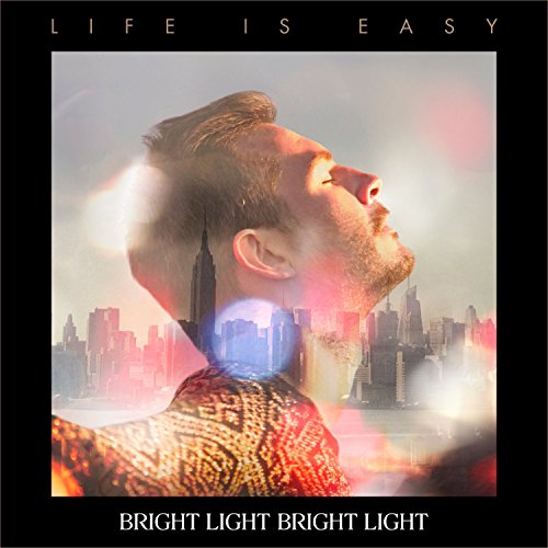 Album cover with a man and cityscape, double exposure effect, black border.