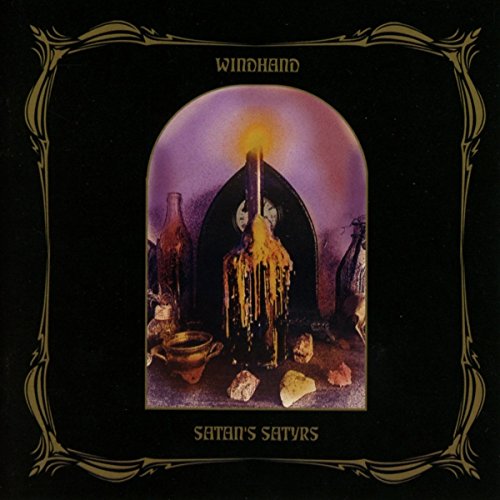 Black album cover with gold border and a central image of a melting candle.