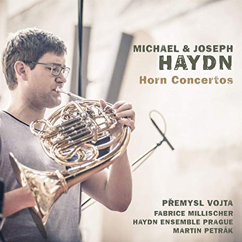CD cover featuring a man playing a French horn, with text listing performers.