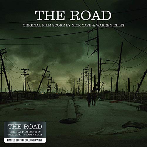"Vinyl record cover featuring a desolate road scene with two silhouetted figures walking."