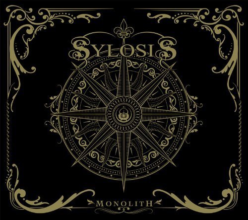The image depicts a black square with a gold design, featuring the word "Sylosis" at the top and "Monolith" at the bottom. A compass rose is centered, surrounded by ornate details. The Amazon logo is visible in the lower right corner. Alt text: Black square with gold compass rose and "Sylosis Monolith" text, Amazon logo present.