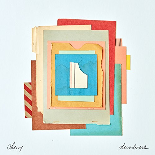 Vinyl record cover with layered, colorful paper collage design.