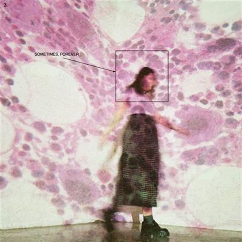 Blurry image of a person against a pink, cellular background.
