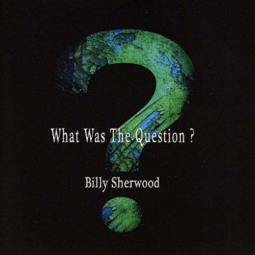 "Album cover with a large green and blue question mark on a black background."