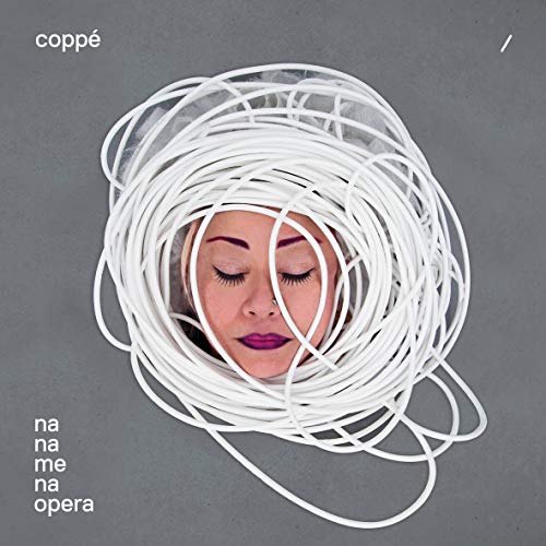 CD cover: woman's face surrounded by white coiled cords on gray.