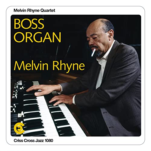 Album cover featuring Melvin Rhyne at an organ, with yellow text.