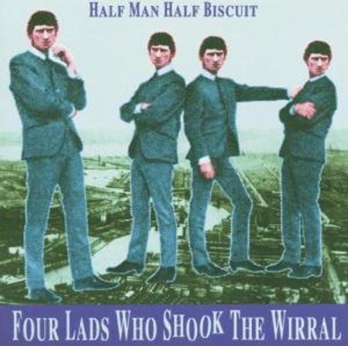"CD cover featuring four men in suits standing on a rooftop."