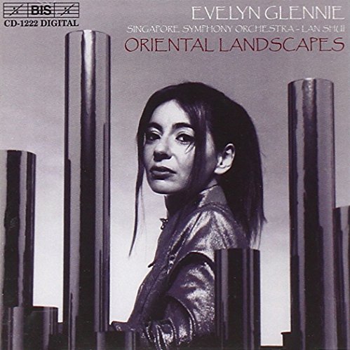 CD cover featuring Evelyn Glennie amidst metallic, cylindrical structures.