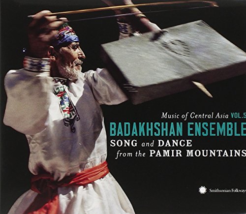 CD cover featuring a man playing a drum, wearing traditional white attire.