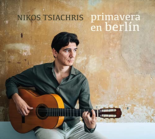 Nikos Tsiachris holding a guitar, album cover for “Primavera En Berlin.”