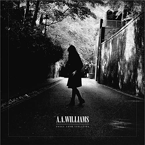 Black and white album cover featuring a lone figure walking down a path.