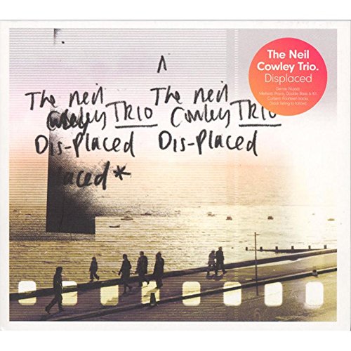 "Album cover with handwritten title 'The Neil Cowley Trio Dis-Placed' and a bridge image."