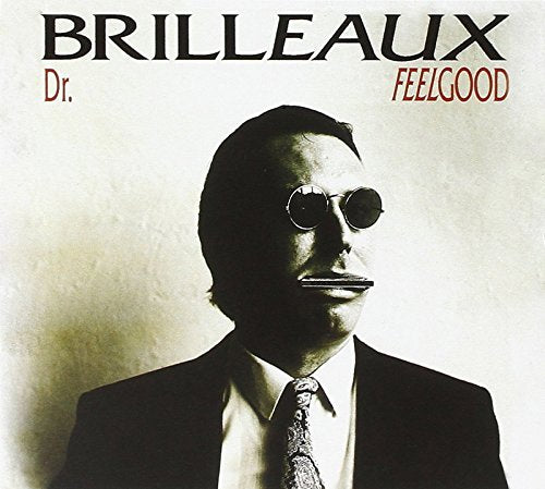 "Red album cover with 'Dr Feelgood' in yellow, featuring a black snake graphic."