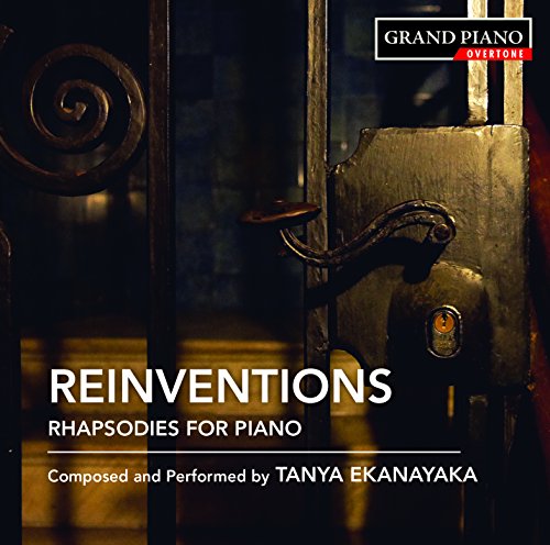 CD cover featuring a dark, ornate door and the text "Reinventions.