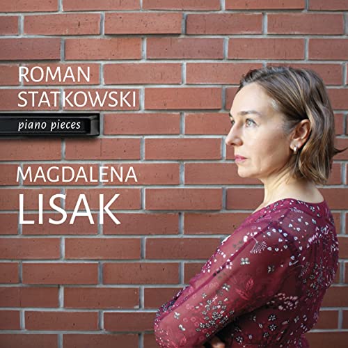 CD cover featuring a woman’s profile against a red brick wall.
