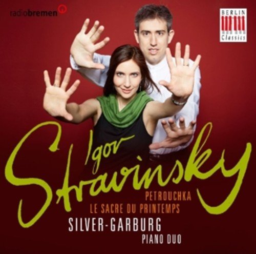 "CD cover with man and woman against red background, text 'Igor Stravinsky'."