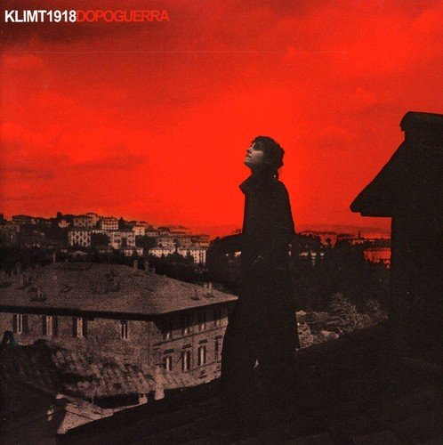 CD cover: Silhouette of a person against a red, hazy landscape.