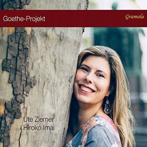 CD cover: woman smiling beside a tree trunk, text āGoethe-Projektā.
