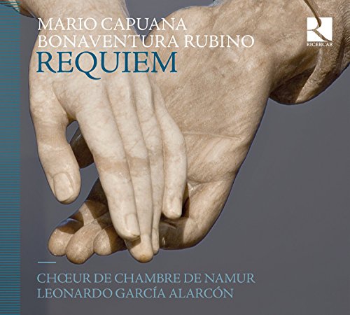 A CD cover featuring a stone statue of two hands against a grey background.