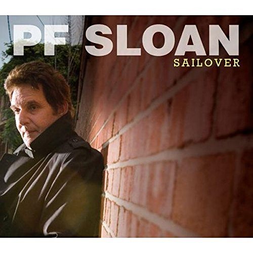 Album cover featuring a man standing against a brick wall, with artist's name displayed.