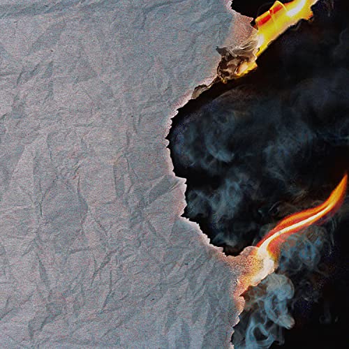 Ripped paper revealing dark, smoky background with orange flames.