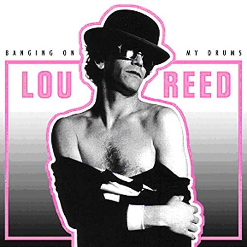 Black and white portrait of Lou Reed in a hat and sunglasses.