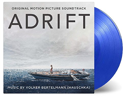 "Blue vinyl record with 'Adrift' soundtrack cover featuring a person on a small boat."