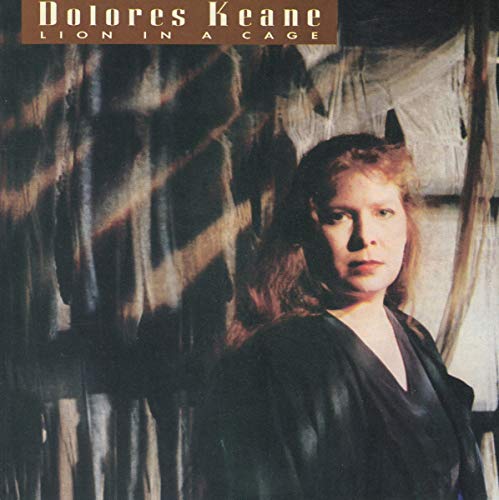 Dolores Keane album cover, portrait of a woman with cage-like shadows.