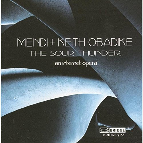 The image shows a CD cover with abstract, curved shapes and white text. For accessibility purposes, a suitable alt text could be: "CD cover with abstract blue and black curved shapes."