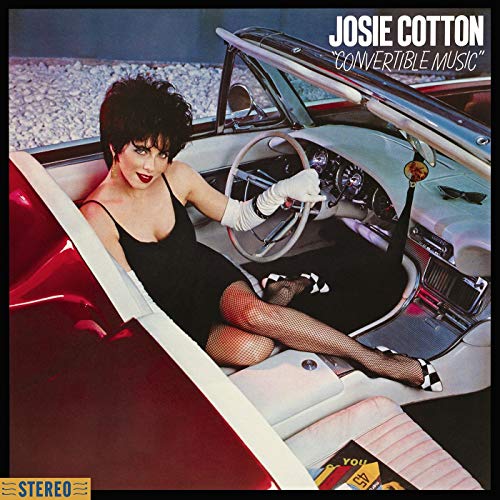 Vinyl record cover featuring a woman in a convertible car, wearing a black dress.