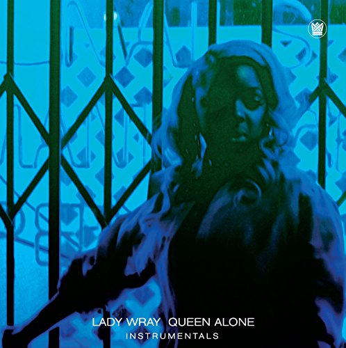 Lady Wray stands before a metal gate in this blue-toned album cover.