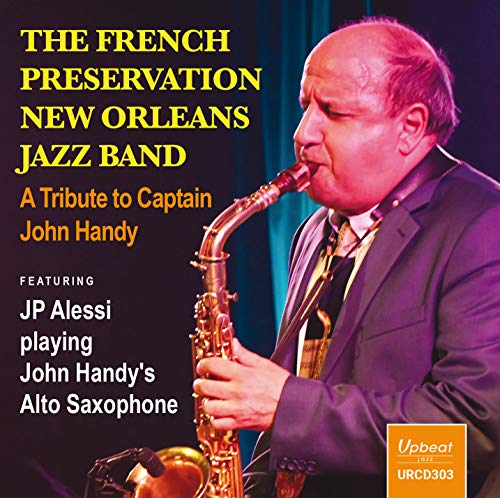 "CD cover featuring a man playing a saxophone, with text and logo."