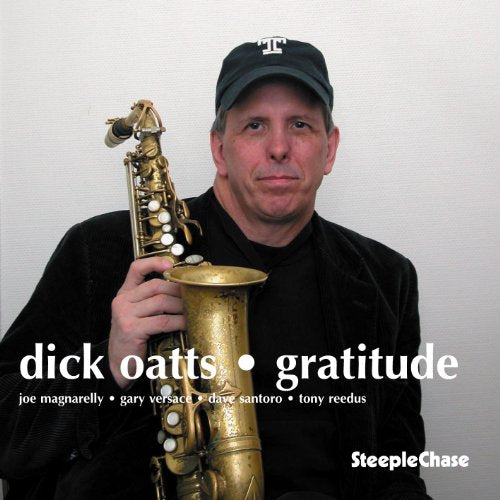 Dick Oatts holds a saxophone on the album cover “Gratitude”.