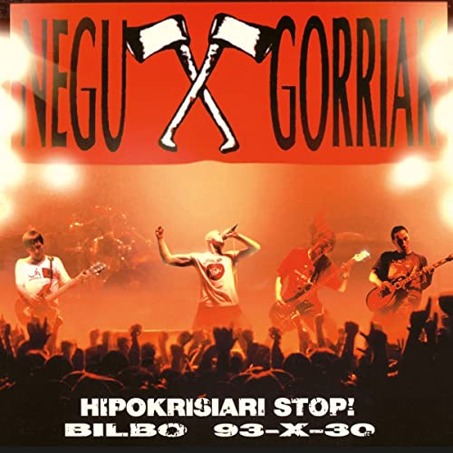Negu Gorriak band performing live with a crowd, red and black cover art.
