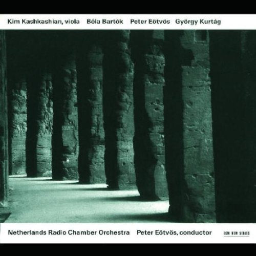 Black and white photograph of stone pillars on a CD cover with text borders.