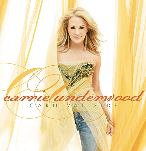 Carrie Underwood album cover featuring a blonde woman in a gold dress and jeans.