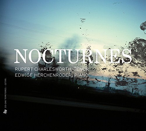 "CD cover with 'Nocturnes' title, featuring a rainy window with a blue sky."