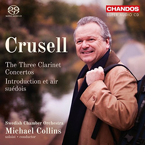 CD cover featuring a smiling man holding a clarinet case, outdoors.