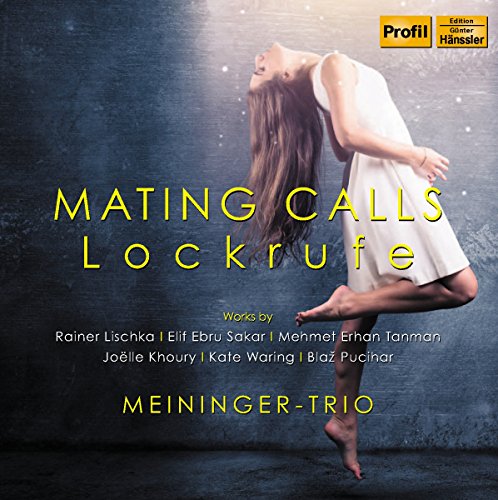 "CD cover with a woman in a white dress dancing against a dark background."