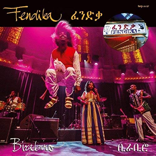 Vinyl album cover featuring a band performing on stage under purple lighting.